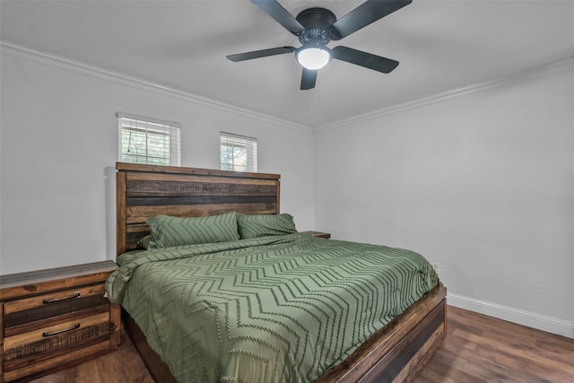 bedroom featuring ornamental molding, hardwood / wood-style floors, and ceiling fan