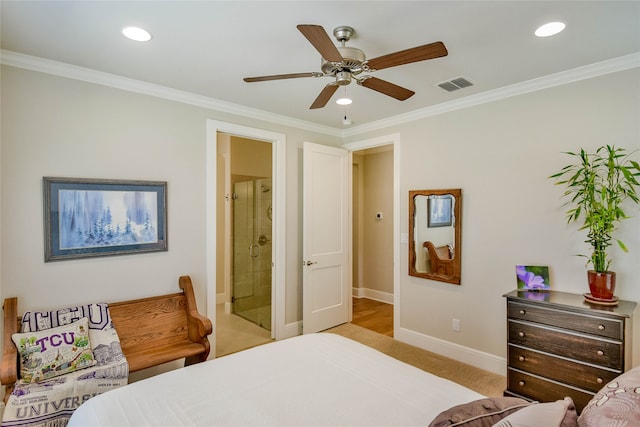 bedroom featuring crown molding, ceiling fan, light carpet, and ensuite bath