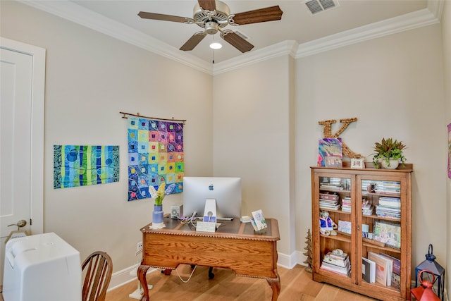 home office with ceiling fan, ornamental molding, and light hardwood / wood-style flooring