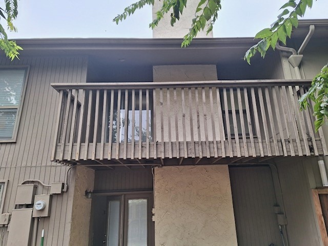 rear view of house with a balcony