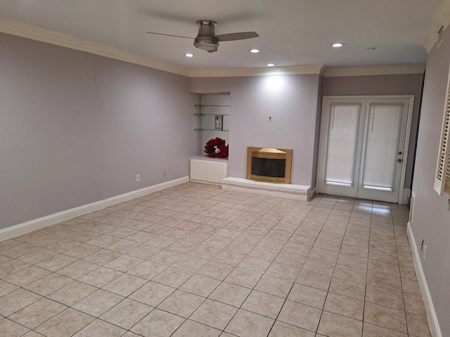 unfurnished living room featuring light tile patterned flooring, ceiling fan, and crown molding