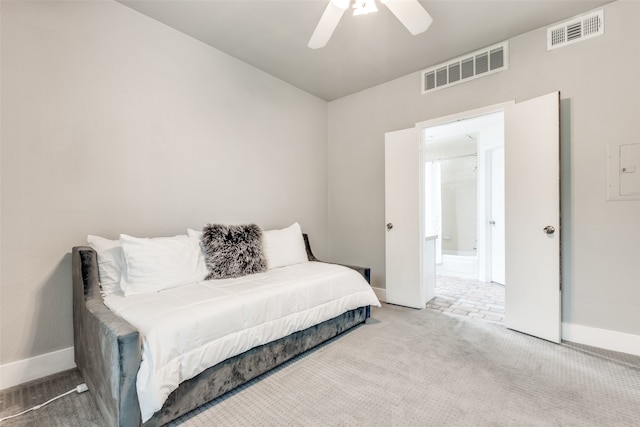 carpeted bedroom with ceiling fan