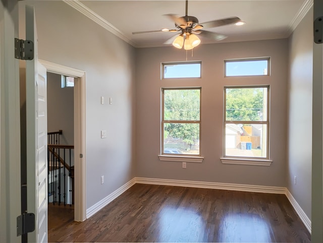 unfurnished room with ceiling fan, dark wood-type flooring, and ornamental molding