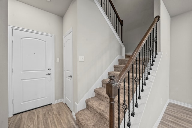 entrance foyer with light wood-type flooring