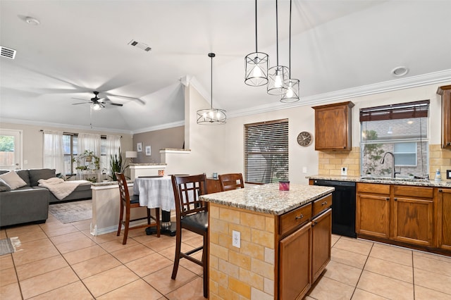 kitchen featuring a kitchen island, dishwasher, sink, crown molding, and pendant lighting