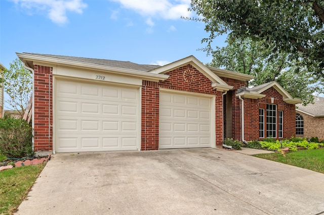 ranch-style house featuring a garage