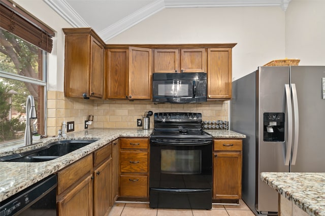 kitchen featuring sink, black appliances, ornamental molding, and light tile patterned floors