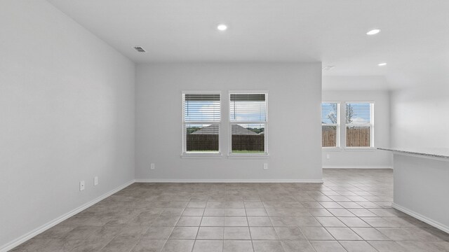 view of tiled spare room