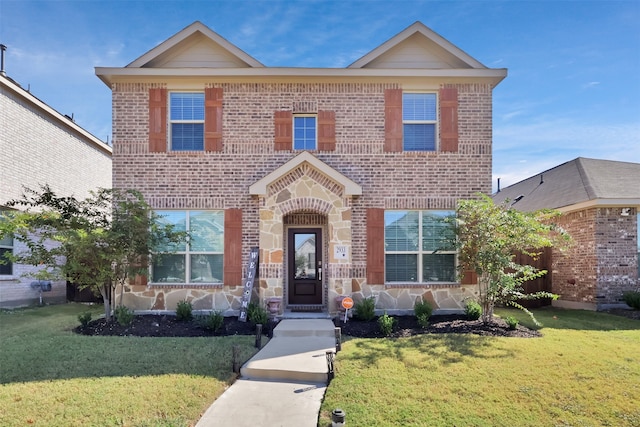 view of front of home with a front yard