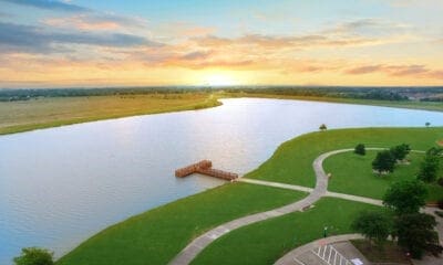 aerial view at dusk with a water view