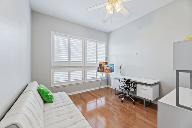 office featuring light hardwood / wood-style floors and ceiling fan