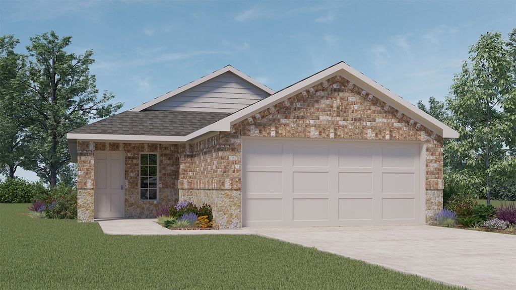 ranch-style house featuring a front yard and a garage