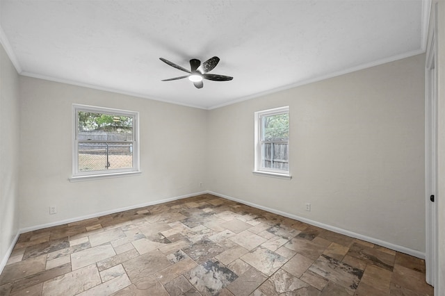 unfurnished room with ornamental molding and ceiling fan