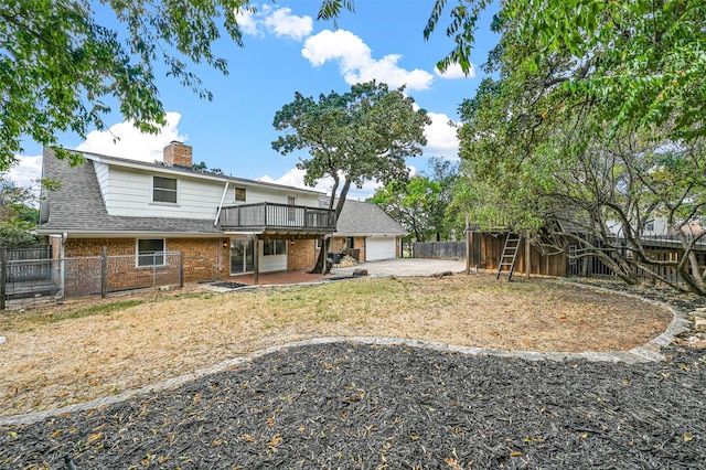 rear view of house with a patio