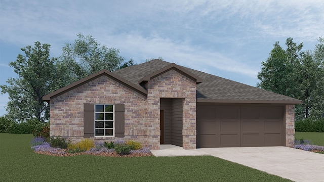 view of front of home featuring a front yard and a garage