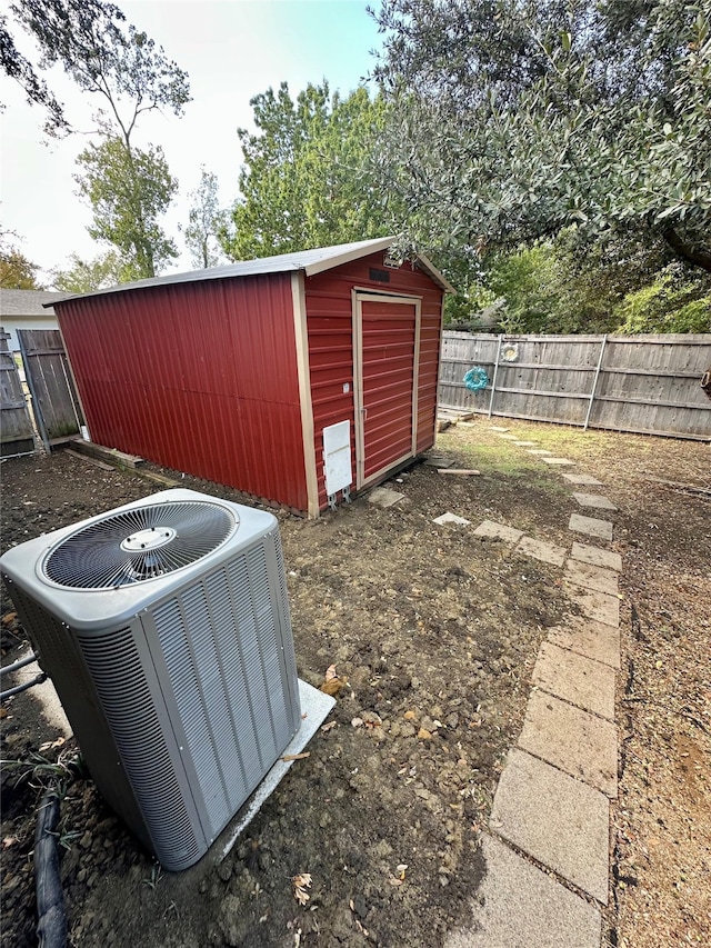 view of outdoor structure featuring central AC unit