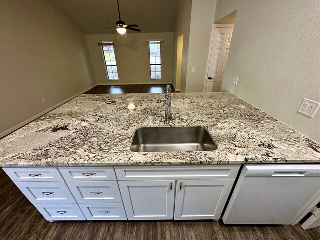 806 Mckinney Ave, Princeton, TX 75407 - kitchen featuring a ceiling fan, dishwasher, a sink, dark wood-style floors, and white cabinetry