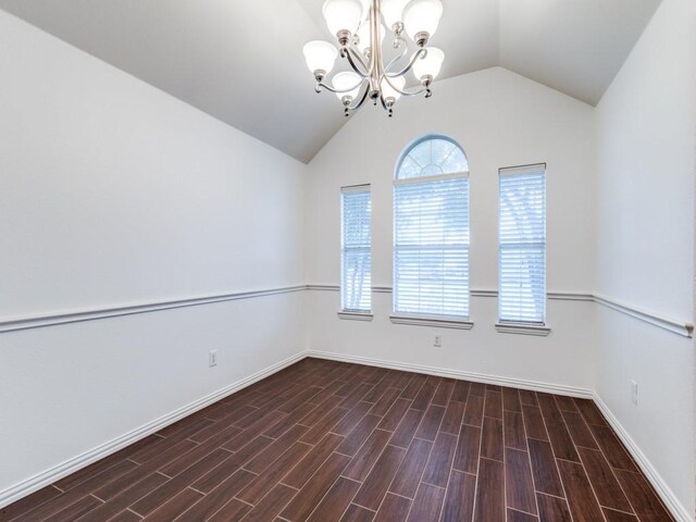 unfurnished room with light colored carpet, a wealth of natural light, and lofted ceiling