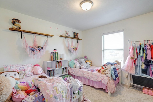 bedroom featuring carpet