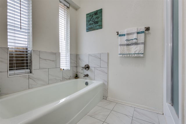 bathroom with a tub