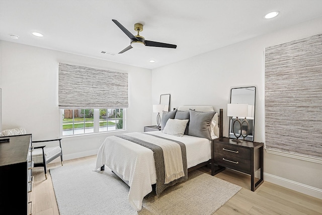 bedroom featuring ceiling fan and light wood-type flooring