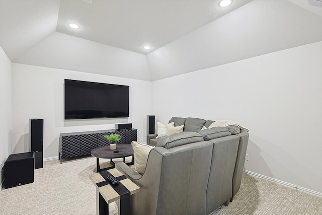 carpeted living room with vaulted ceiling