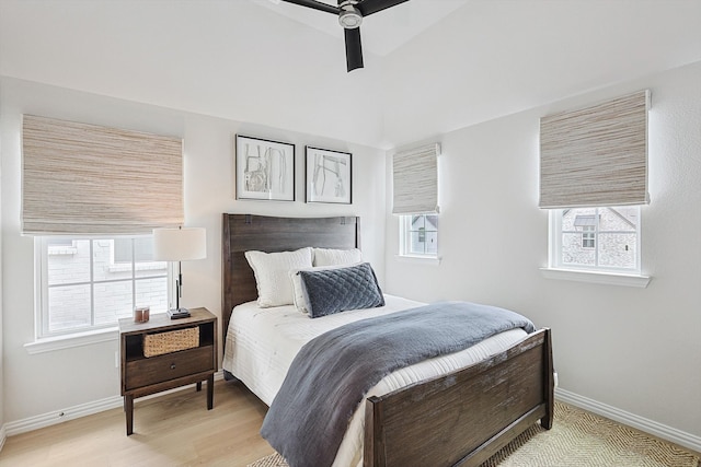 bedroom featuring light hardwood / wood-style floors and ceiling fan