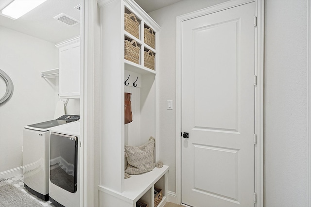 mudroom featuring washer and dryer