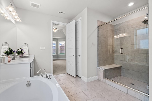 bathroom featuring tile patterned flooring, vanity, independent shower and bath, and ceiling fan