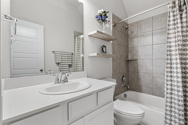 full bathroom with vaulted ceiling, vanity, toilet, and shower / tub combo