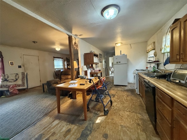 kitchen with white appliances and sink