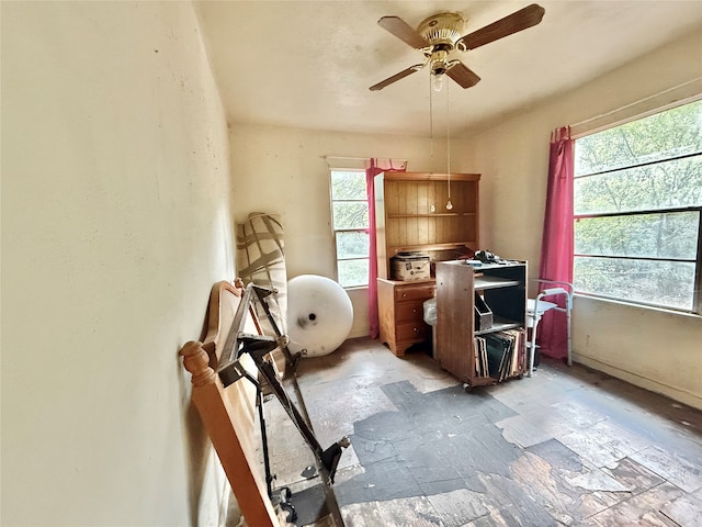 office space with ceiling fan