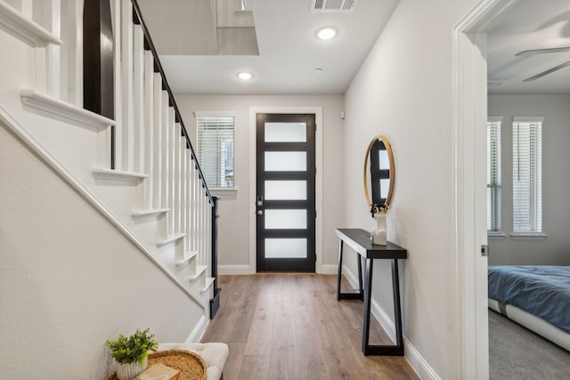 entrance foyer with light hardwood / wood-style floors