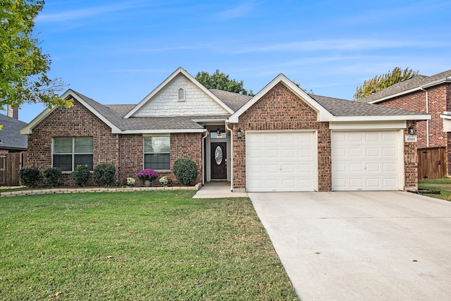 ranch-style home with a garage and a front lawn