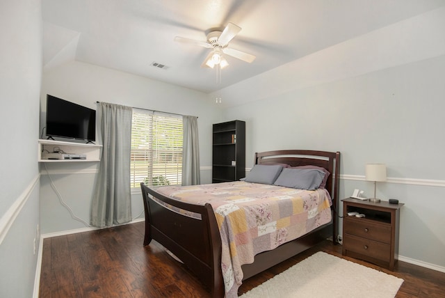 bedroom featuring ceiling fan and dark hardwood / wood-style flooring