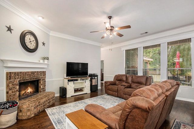 living room with a fireplace, ceiling fan, dark hardwood / wood-style flooring, and ornamental molding