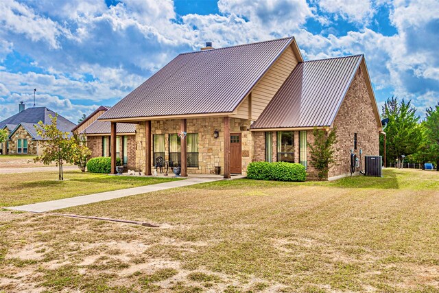 view of front of property with a front yard and a carport