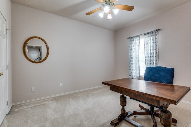 office area featuring ceiling fan and light colored carpet