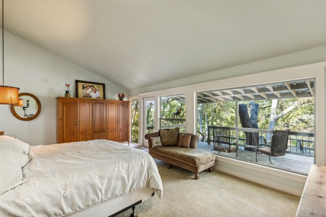 carpeted bedroom with vaulted ceiling