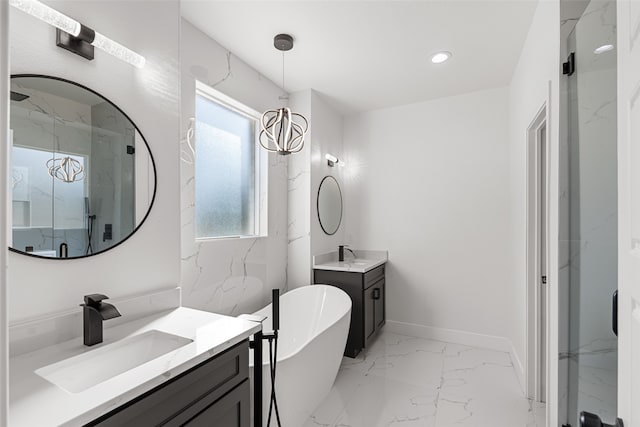 bathroom featuring vanity and independent shower and bath