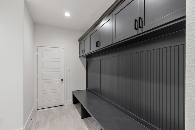 mudroom with light hardwood / wood-style floors