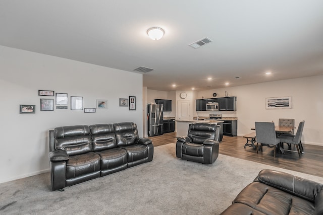 living room with hardwood / wood-style flooring