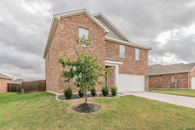 view of front of house featuring a front yard and a garage