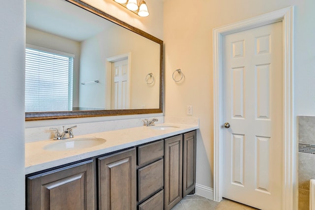 bathroom featuring vanity and tile patterned flooring