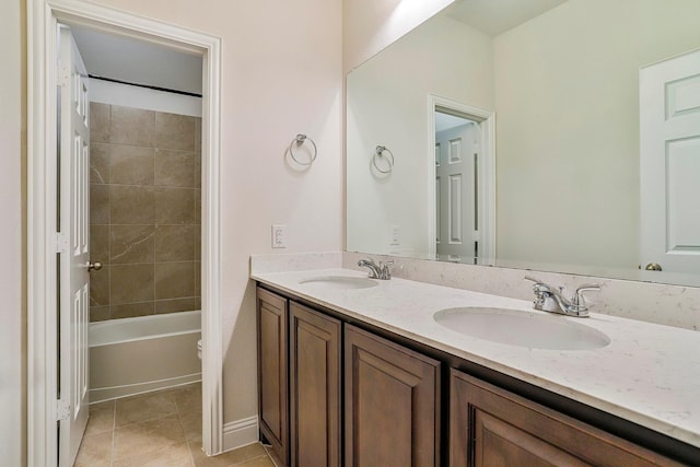 bathroom with vanity and tile patterned flooring