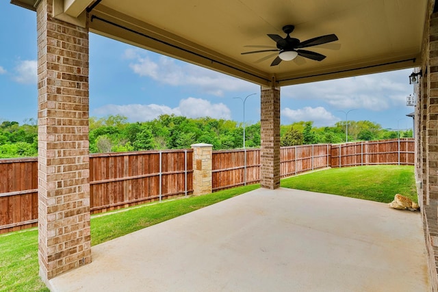 view of patio featuring ceiling fan