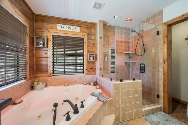 bathroom with wooden walls and plus walk in shower