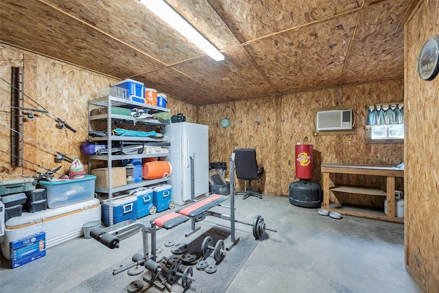 exercise room featuring a wall mounted air conditioner