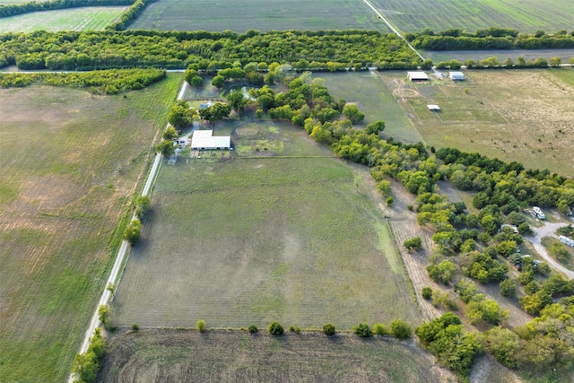 birds eye view of property with a rural view