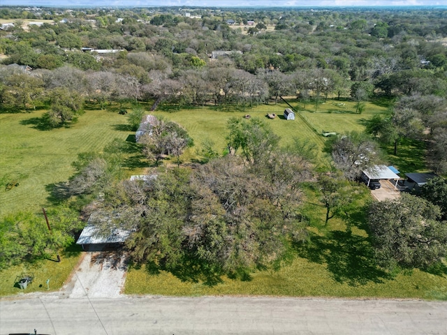 birds eye view of property featuring a rural view